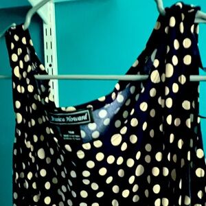 Navy + cream polka dot dress, short jacket. . I am 5’2 falls at mid calf.